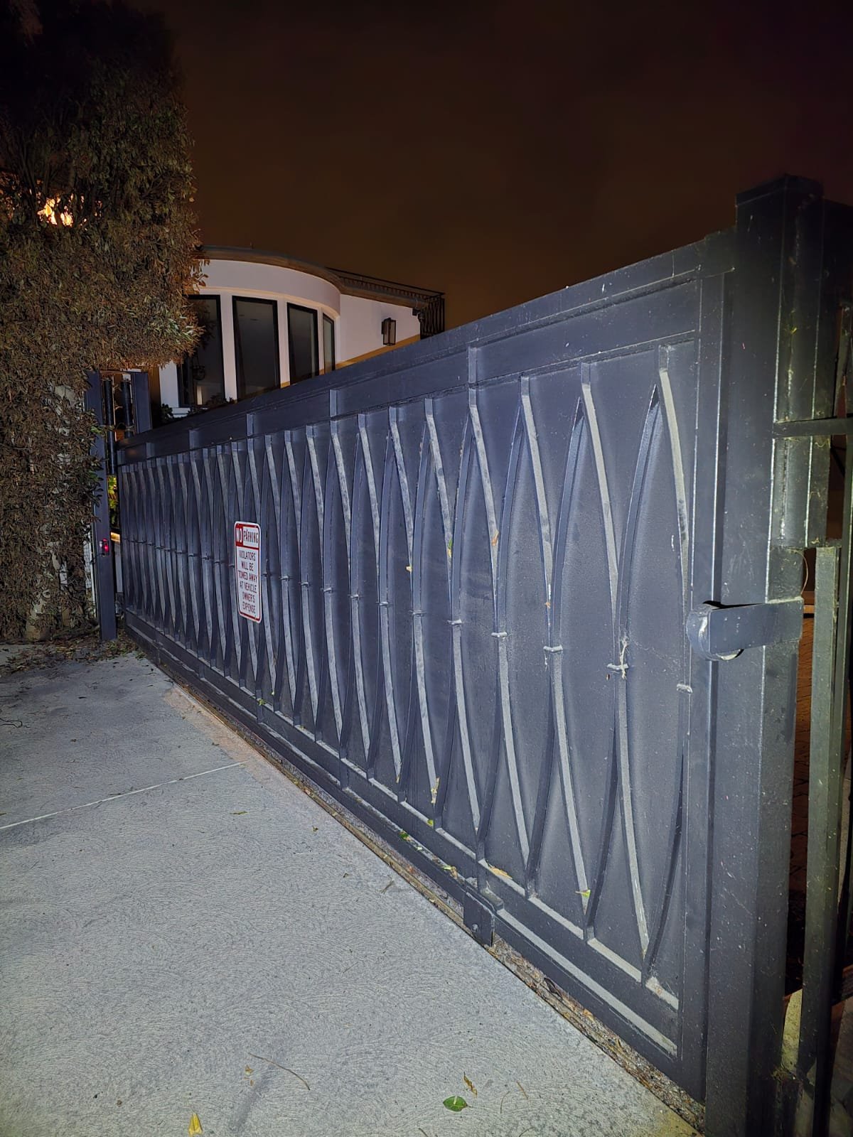 WIN technician servicing an electric gate in West Los Angeles